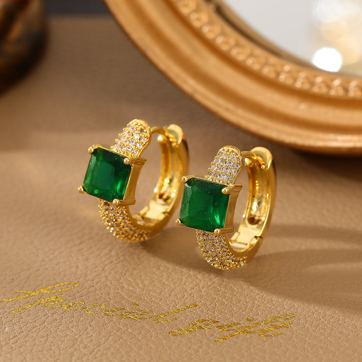 Emerald Flare Huggie Hoop Earrings
